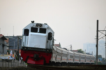 Obraz premium The train is running on the rails towards the destination