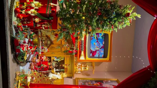 Street decorated for New Year and Christmas Market in Rothenburg ob der Tauber, Bavaria, Germany December 22, 2022. Vertical video. High quality 4k footage