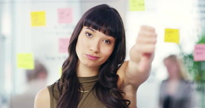 Business woman, thumbs down and disappointed for bad news, disagree or bad review at office. Portrait of female person or employee with no emoji, negative or rejection for wrong, mistake or workplace