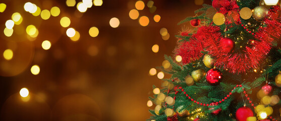 Obraz na płótnie Canvas Christmas tree decorated with red and golden festive balls against blurred background, bokeh effect. Banner design with space for text