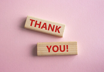 Start now symbol. Wooden blocks with words Start now. Beautiful pink background. Business and Start...