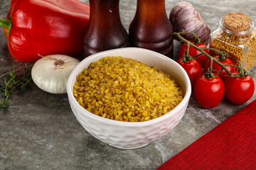 Dry wheat bulgur cereal heap