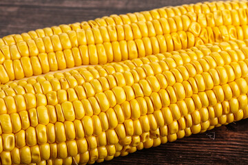 Sweet yellow raw corn cob