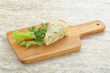 Blue cheese piece over board