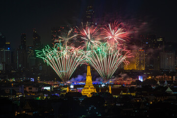 Bridge and Wat Arun Landmark, Bangkok, Thailand have fireworks  and light up show celebrating the festival along the Chao Phraya River on December 2, 2023.