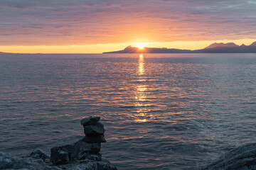 Sunset over the Isle of Eigg from north of Glenuig, Highlands, Scotland - obrazy, fototapety, plakaty