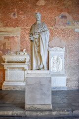 Pisa, Tuscany, Italy - November 24, 2023: statue of the distinguished mathematician Leonardo...