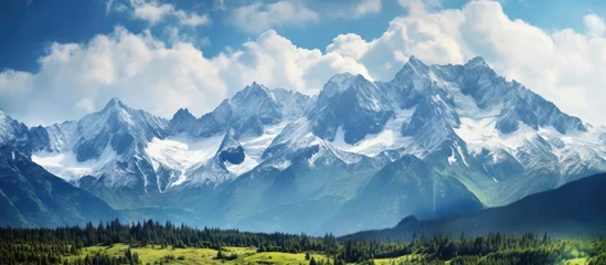 Tuinposter Tatra View of mountain peaks in spring time in High Tatras. Copyspace image. Header for website template