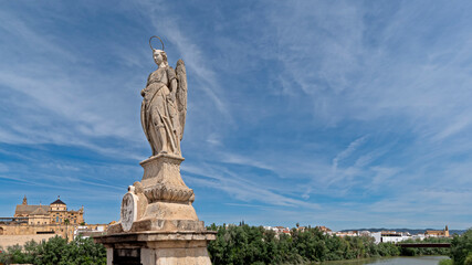 Statue of Saint Raphael in the middle of the Roman Bridge in Córdoba, Spain
