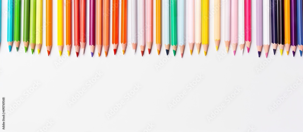 Aufkleber school supplies with colorful pens or water color pens note book and orange highlight pen. copyspace