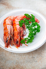 gambas langoustine large shrimp delicious prawns ready to eat healthy eating cooking appetizer meal food snack on the table