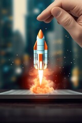 A hand holding a tablet with a rocket emerging from the screen. Perfect for technology, innovation, and space exploration concepts