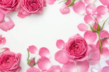 Fotobehang Floating rose flowers and petals in milk bath. Floral background. Сopy space, selective focus © ClareM