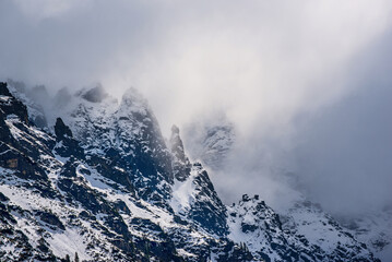 Mountain peaks near Morskie Oko Lake in Poland at Winter. Tatras range - obrazy, fototapety, plakaty