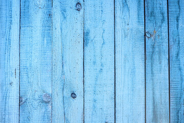 Fototapeta na wymiar Natural old wooden wall painted blue, texture for photo design, for making photo backdrops, banner for advertising or invitation, space for text,