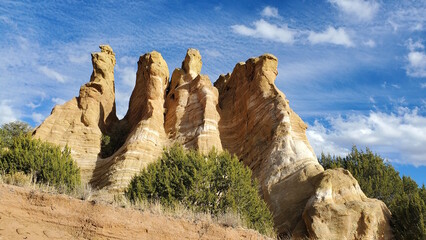 This photo showcases the towering and colorful rock pinnacles found in New Mexico. The unique...