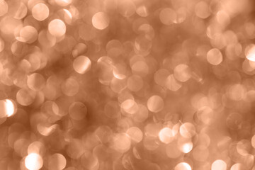 Color of the Year 2024 Peach Fuzz Abstract background. Glitter texture christmas background.