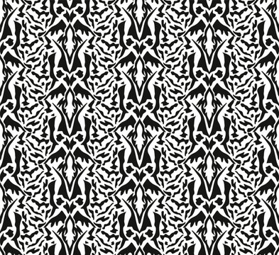 Seamless, black and white tiger skin texture busy pattern.