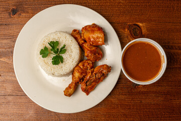 Chicken wings with white rice and beans