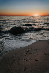 Tranquil Sunset at Oceanic Seashore with Wind Waves