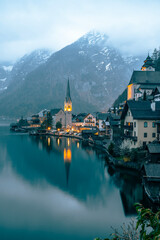 Great promotional photos of Austrian dream town Hallstatt landscapes with fantastic sunset colors and clouds in winter season