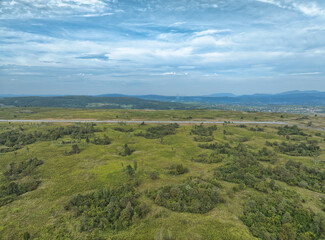 Fototapeta na wymiar Nature Overtaking Zeljava Airfield