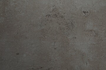 Grey stone surface as background, closeup view