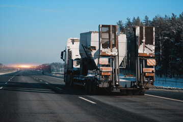 Heavy Duty Cargo Truck Transporting Special Project Cargo. Power Converter Transportation. Electromagnetic Voltage Transformer Shipping Logistics