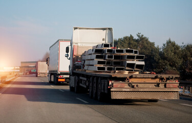 Cargo Truck Transporting Steel Construction Parts. Non-Standard Type Of Cargo For Shipping