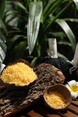 Spa composition with orange sea salt on wooden table