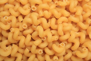 Raw cavatappi pasta as background, top view