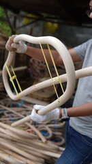 person working in the rattan factory