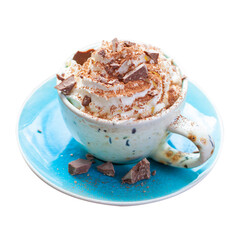 A beautiful blue cup of coffee with whipped cream, cocoa powder and raspberries on rustic wooden background