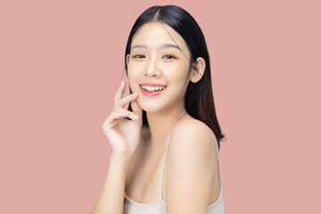 Portrait of young beautiful Asian woman with healthy facial skin in K-beauty make up isolated on...