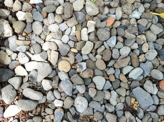 photo of white stone pebbles can be used as wallpaper