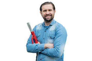 A well-dressed welder poses with his arms crossed before starting his work.