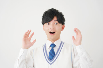 驚く男子高校生　白背景