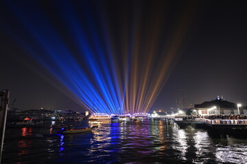 Light and firework show over the old steel bridge ,Phra Phuttha Yodfa Bridge at Bangkok, Thailand Theme Vijit Chao Phraya 2023 Bangkok Thailand