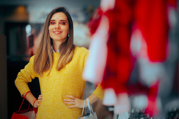 Happy Woman Holding Shopping Bags in a Store. Happy lady buying new fashion items in a stylish...
