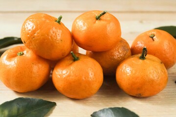 tangerines on a wooden table