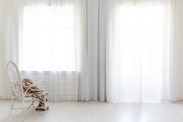 Vintage chair in empty white home room interior