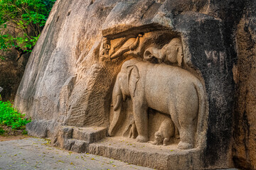 Fototapeta na wymiar Single Elephant Statue Rock Carved near Thirumoorthi Cave Temple is UNESCO's World Heritage Site located at Mamallapuram or Mahabalipuram in Tamil Nadu, South India