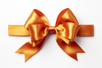 An orange bow made from ribbon, isolated on a solid white background