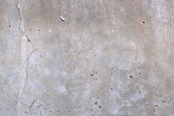Dirty old cracked concrete wall texture background. Old rough and grunge texture wall. Texture of cement wall. Stains black mold on surface.