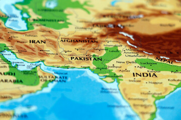 world map or atlas of asian continent, india, iran, pakistan, afghanistan, tehran, kabul, islamabad countries in close up