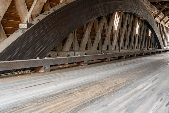 Interior image of historic timber one lane covered bridge in the Town of Newfield, Tompkins County NY.	