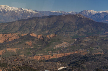 scenic view of Tian Shan mountains from Amirsoy ski resort in spring (Tashkent region, Uzbekistan)	