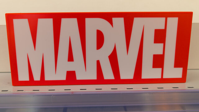 marvel comics shop logo brand and text sign red on boutique library books