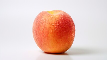 Fototapeta na wymiar A juicy peach, its fuzzy skin glistening, prominently displayed against a pure white backdrop.