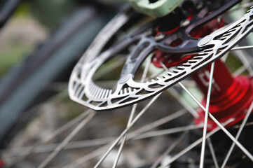 Fototapeta na wymiar disc brakes on a bicycle wheel close-up. mountain bike detail close up